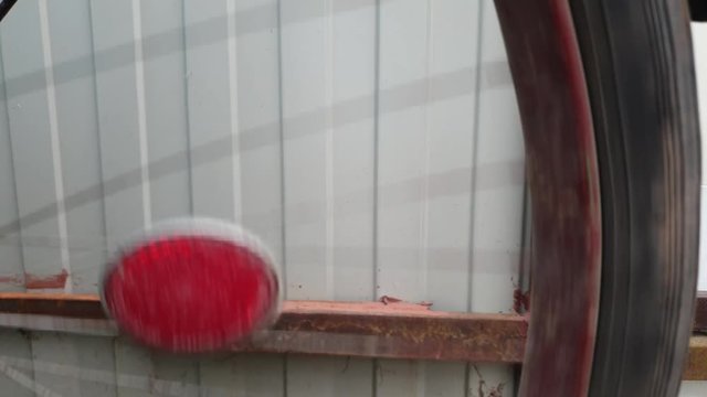 The Wheel spinning on an old bike. The wheel is spinning.