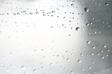abstract drops glass background / texture fog rain, seasonal background, clear glass with water