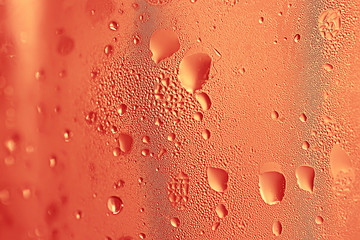 yellow tinted glass drops / abstract background texture