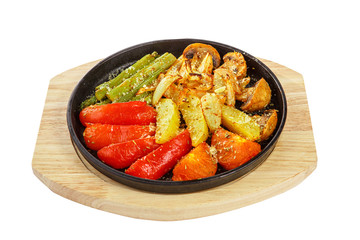 Vegetables grilled portion on pan white isolated