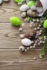 colorful easter eggs on wooden background