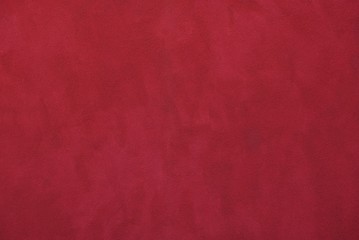 red paint background on stucco concrete wall