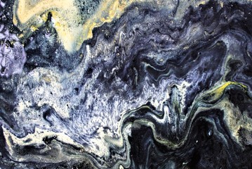 Abstract artistic texture. Liquid ink mixing in water. Color creating an interesting structure....