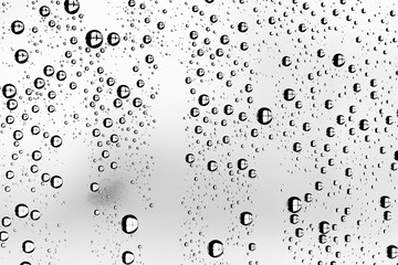white isolated background water drops on the glass / wet window glass with splashes and drops of water and lime, texture autumn background