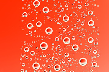 red wet background / raindrops to overlay on a window, weather, background drops of water rain on a...