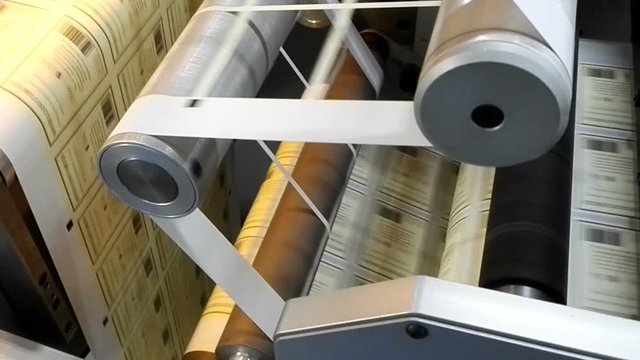 production of labels. Rotary die cutting using a cylindrical die on a rotary press (the factory produces labels)