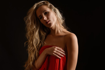 Naklejka premium Portrait of beautiful emotional woman with green eyes. Studio shot.