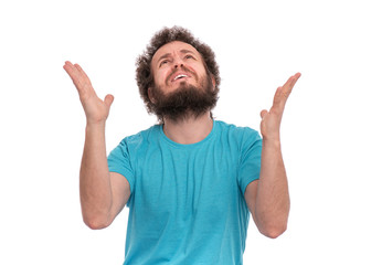 Portrait of caucasian crazy bearded Man with funny Curly Hair - saying prayers, isolated on white...