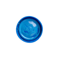 Cap from a blue gouache jar paints - top view, isolated on white background with copy space. Cans of different colors gouache paints.