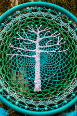 Naklejka premium Handmade dream catcher with feathers threads and beads rope hanging