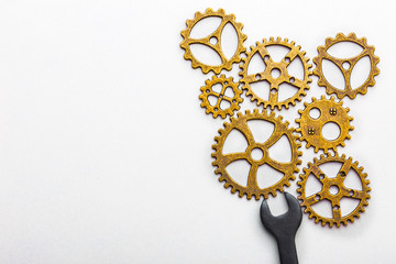 Top closeup view of gear wheels collection on white background with blank space for text. Top view, flat lay.