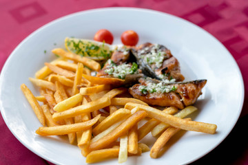 Grilled steak with French fries