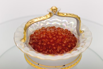 Luxury Red Caviar in the vase. Food photo concept.