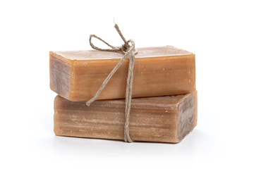 brown natural organic soap isolated on white - obrazy, fototapety, plakaty