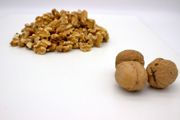 Walnut Kernels (Other Names: Juglans Regia, Persian Walnut, English Walnut, Circassian Walnut). Isolated Image On A White Background