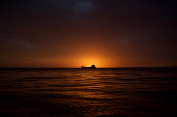 Fototapeta na wymiar oil tanker sunset