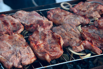 Process of cooking meat. Steak on barbecue. Preparation appetizing pork outside