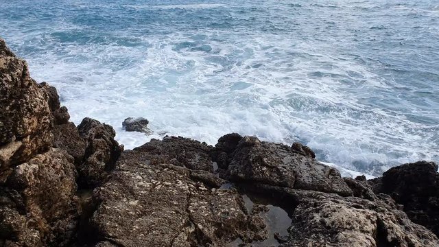 Relaxing Mediterranean Sea Waves Crashing On Rocks In Roquebrune-Cap-Martin In France, French Riviera, Europe - 4K Video