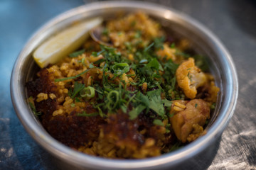 Close up of paella dish in metal bowl