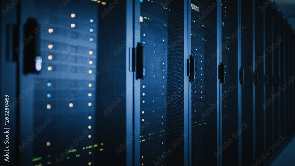 Fototapete Shot of Dark Modern Data Center With Row of Fully Operational Server Racks. Modern Hi-Tech Concept for Cloud Computing, Artificial Intelligence, Supercomputer, Cybersecurity