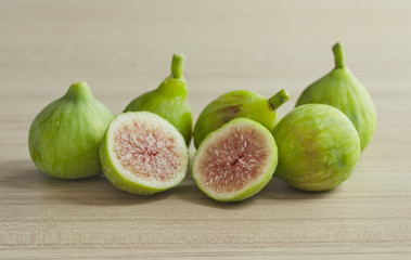 Ripe figs on a on a wooden table