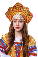 Traditional Russian folk costume, portrait of a young beautiful girl