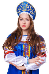 Traditional Russian folk costume, portrait of a young beautiful girl