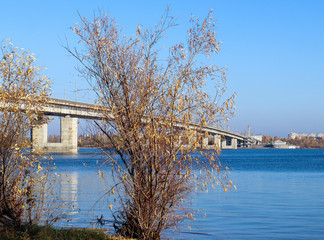 Autumn day in Arkhangelsk. View of the river Northern Dvina and automobile bridge in Arkhangelsk.
