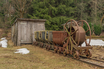 Fototapeta premium Narrow gauge in spring cloudy day in Grube Tannenberg in Krusne mountains