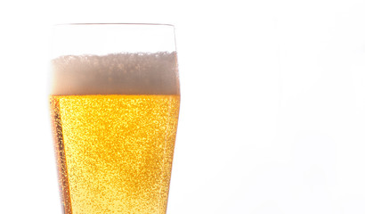 Closeup of a full bubbly beer glass