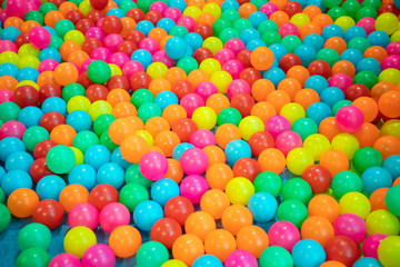 multicolor plastic balls background and texture.