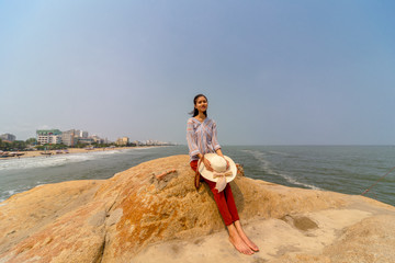 young woman at Samson beach in Vietnam