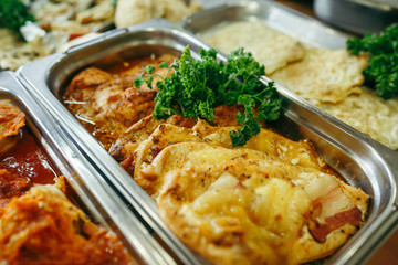 Big banquet table with chafing dish heaters