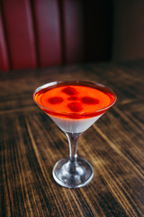 Jelly with fresh berries at the showcase