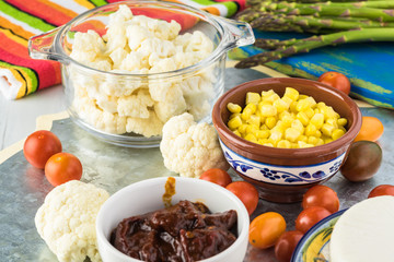 Mexican food. Veggie corn tostadas with caulflower mash.