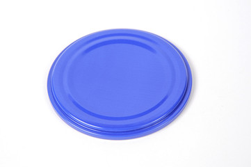 Screw cap for glass jars. For canning, canned food. Blue cap on white background