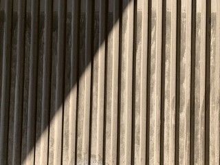 The concrete wall under sun light