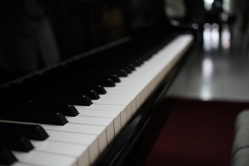 Piano keyboard background with selective focus.