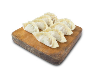 raw dumplings or gyoza isolated on white background