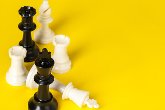 Premium AI Image  A yellow background accentuates the presence of chess  pieces and the board Vertical Mobile Wallpaper