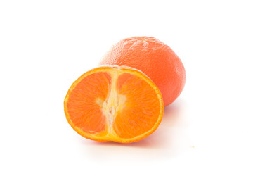 Fresh orange fruit with sliced half of orange isolated on the white background.