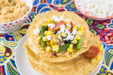 Mexican food. Veggie corn tostadas with caulflower mash.