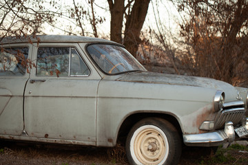 Photo of one old car in the village
