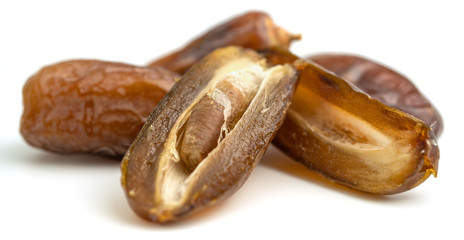 Dried of sweet dates palm fruits on white background. Dates is a dried fruit that provides high energy.
