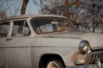 Photo of one old car in the village