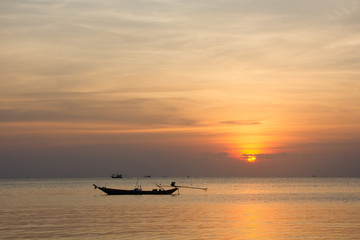 Fototapeta na wymiar Traditional thai boat at sunset in Thailand