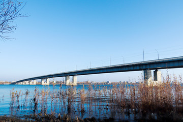 Autumn day in Arkhangelsk. View of the river Northern Dvina and automobile bridge in Arkhangelsk.