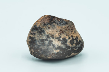 Chondrite Meteorite isolated, a piece of rock formed in outer space in the early stages of Solar...