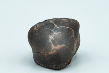 Chondrite Meteorite isolated, a piece of rock formed in outer space in the early stages of Solar...