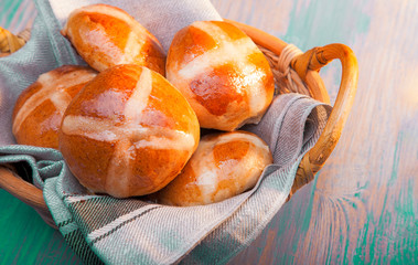 Hot cross buns on basket Top view, copy space. Easter baking
